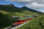 Wolkenlotto am 09.07.2016: Der BDhe 4/8 211 erreicht gemeinsam mit dem BDhe 4/8 212 die Kleine Scheidegg.