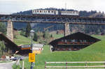 MOB: Der MOB Nostalgiezug aus dem Jahre 1905 der Museumsbahn Blonay Chamby mit BCFe 4/4 11 + BC 22  auf dem Viadukt Gstaad im Mai 2005.