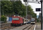 Die MOB HGem 2/2 2501 (ex MVR) und abgestellte MOB Wagen sorgen in Vevey für ein buntes Bild.