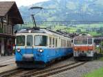 MOB - Triebwagen ABDe 8/8  4002 neben E-Lok GDe 4/4  102 im Bahnhof von Saanen am 29.07.2007