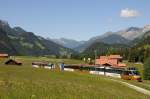 Die Ge 4/4 8004 verlsst Gruben am 13. Juni 2009 mit dem D 3118 GOLDENPASS PANORAMIC Montreux - Lenk.