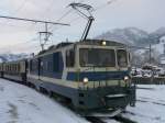 MOB - Schnellzug nach Montreux mit der Lok GDe 4/4 6001 im Bahnhof Zweisimmen am 03.12.2010