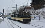 Regio 2217, Goldenpass Classic, mit der GDe 4/4 6004 bei Einfahrt in Gstaad, 17.12.2012.