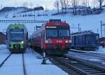 BLS/MOB: Abendstimmung in Zweisimmen am 2. Januar 2014. Nicht gestellte sehr abwechslungsreiche Fahrzeugparade mit BLS RABe 102  LOETSCHBERGER , BLS Bt 939 und MOB BDe 4/4 3005-3006.
Foto: Walter Ruetsch