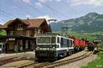 GDe 4/4 6001 mit  Kehrichtzug  in Saanen (7. Mai 1996)