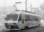 mrv - Zahnrad Triebwagen Beh 2/4 72 bei der einfahrt in den Bahnhof von Blonay am 24.03.2008 bei Schneefall um 13.55 Uhr 