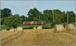 CEV BDeh 2/4 N° 74 und Bt 221 bei Château d'Hauteville.
19. Juli 2012