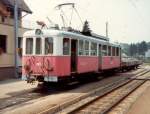 Triebwagen BDe 4/4 101 mit Gterwagen noch mit CEV Beschriftung im Bahnhof von Bloney im Juni 1983