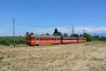 Regio bestehend aus Bt 301 (alte Lackierung), ABt 303 (neue Lackierung, ex. Bt) und Be 4/4 203 zwischen Nyon und L'Asse, 23.07.2015.