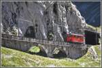 Ein TW der Pilatusbahn hat den Fleimentunnel kurz vor drt Bergaststion verlassen. (27.08.2012)