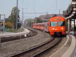 Mandarindli Be 4/4 52 als S8 nach Bern in Urtenen-Schnbhl. 13.10.2010