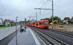 Der ABe 4/12 68 fhrt am 10.10.2013 aus dem neuen Bahnhof Biberist RBS in Richtung Bern aus.