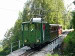 SPB - Zug mit der Lok He 2/2 12 unterwegs auf die Schynigen Platte bei Wilderswil am 03.08.2013