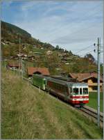 Der AOCM Regionalzug 43 auf Talfahrt kurz vor Val d'Illiez.
25. Okt. 2013