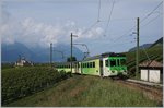 Etwas oberhalb von Aigle ist der ASD BDe 4/4 403 mit seinem Bt als Regionlazug 440 Richtung Les Diablerets unterwegs.