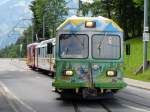 TPC / BVB - Bunt Bemalter Pendelzug der  BVB = Bex - Villars - Bretaye mit Steuerwagen Bst  53 + Personenwagen Bs 52 + Lok HGe 4/4  32 unterwegs am  29.07.2007