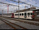 tpf - Reserve Pendelzug an der Spitze der Triebwagen Be 4/4 121 + B 209 + B 207 sowie am Schluss der Steuerwagen ABt 221 abgestellt im Bahnhof Bulle am 19.12.2020