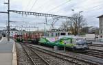 Ge 4/4 21 mit dem Sps 31 85 471 9 250-6 in Yverdon-les-Bains, 20.11.2013.