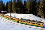 WAB-Zug 122 mit Gelenksteuerwagen 243 in der selten benutzten Ausweiche Bannwald.