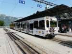 WAB - Steuerwagen Bt 241 mit Werbung im Bahnhof von Wengen am 13.07.2013