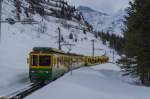 Am 15. März 2015 fährt der BDhe 4/8 133 zwischen der Wengernalp und der Allmend talwärts. Im Hintergrund die Jungfrau und das Silberhorn.