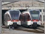 130 009-4 und 130 007-8 sind zwei schmalspurige Spatz und stehen vor dem Depot der Zentralbahn in Stansstad. (22.10.2010)