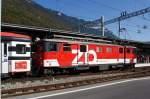 De 110 022-1 der ZB mit einem Regionalzug am 02.10.2011 im Bahnhof Interlaken Ost.