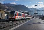 Der Zentralbahn IR 2919 von Interlaken nach Luzern wartet in Meiringen auf die Weiterfahrt. Der Zug besteht aus dem  Fink  160 002-8 und  dem halbe  Adler  150 101-1.

17. Februar 2021