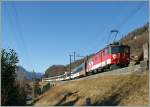 De 110 022-1 mit eine Goldenpass IR nach Luzern bei Niederried am 09.