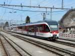 zb - Triebwagen ABe 130 003-7 und ABe 130 005-2 in Giswil am 31.03.2012 .. Standort des Fotografen auserhalb der Geleise ..