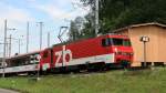 HGe 4/4 101 962-9 hat soeben in Giswil die Zahnstangeneinfahrt passiert. IR 2224 Luzern nach Interlaken Ost am 04.08.2012.