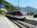 zb - Einfahrender Regio ABe 130 003-7 in Alpnachstad am 10.09.2012