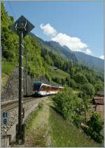 Der 130 010-2 verlsst als Regionalzug nach Meiringen die (Bedarfs)-Haltestelle Ebligen.5. Juni 2013