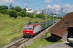 446 018 schiebt am 24.06.2010 einen Voralpenexpres nach.