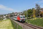 Re 446 015 mit einem VAE am 20.04.2014 bei Uznach.