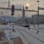 SOB mit 456 096 vor St. Leonhard im Gegenlicht. St.Gallen im Februar 2013.