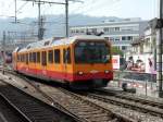 SZU - Triebwagen Be 4/4 556 524-7 bei der Durchfahrt im Bahnhof Zrich Giesshbel am 22.04.2010