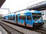 Ein GTW mit Ostwind Vollwerbung im Bahnhof Weinfelden am 09/10/10.