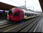 tpf -  RABe 527 194-0 als RE3 Bulle - Düdingen im Bhf. Bulle am 06.01.2024