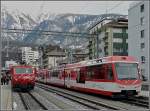 Der Glacier Express wartete am 26.12.09 in Brig auf die Weiterfahrt nach Zermatt neben einem ABDe 4/8 der MGB.