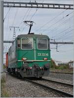 Die BAM MBC Re 4/4 II (UIC 91 85 4420 506-8 CH-MBC) und verdeckt der Te III 155 rangieren in Morges, bzw.