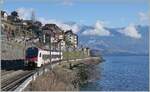 Der neue SBB Flirt3 523 114 ist als S 2 24248 von Aigle nach Vallorbe unterwegs und konnte vor dem Hintergrund des hübschen St-Saphorin fotografiert werden.