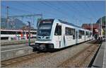 In Aigle wartet der TPC ASD ABe 4/8 473 in der gef�lligen  Glacier 3000  Werbung als R71 432 auf die Abfahrt nach Les Diablerets. 

15. Juni 2026