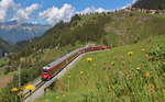 Mit der 644 schiebend, befindet sich der IR1136 (St.Moritz - Chur) bei Bergün auf der Talfahrt.

Bergün, 15. August 2020