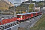 S1 1525 nach Rhäzüns mit Vorortpendel Be 4/4 514 und ABt 1712 auf der neuen Hinterrheinbrücke in Reichenau-Tamins.