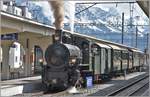 Dampfextrazug 2056 nach Landquart mit G 4/5 107  Albula  in Davos Platz. Im Hintergrund das Tinzenhorn. (13.05.2018)