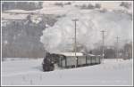 G 4/5 107  Albula  mit herrlicher Dampfentwicklung (kein Wunder bei diesen Minustemperaturen) auf der Ebene vor Bonaduz.