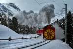 Die Schneeeschleuder Xrod d9213,geschoben von der Gem 4/4 802 zwischen Pontresina und der Bernina Passhöhe.Bild vom 25.1.2015