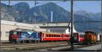 Ge 4/4 II 619  Samedan  und Gm 3/3 233 vor der HW Landquart. (28.06.2010)