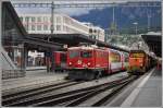 GlacierExpress 902 mit Ge 4/4 1 695  Silvretta  und Ge 3/3 215 in Chur.